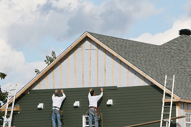 Professional Storm Damage Siding Repair technician working in Sardis, OH